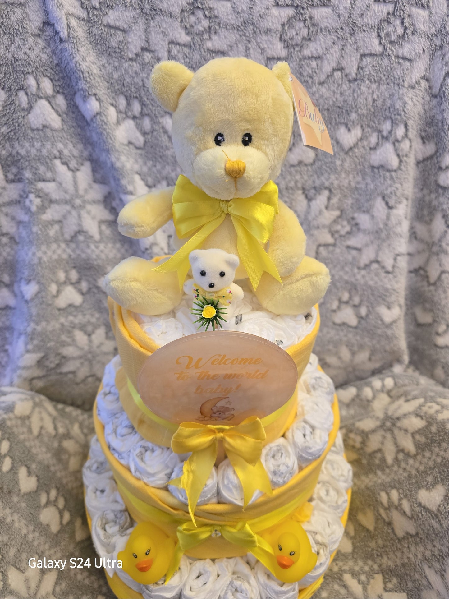 🧸 Yellow Teddy Diaper Cake – “Welcome to the World Baby” 🎁